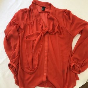 Orange sheer work top